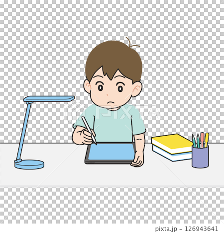 Boy studying on a tablet at a desk Boy studying on a tablet at a desk 126943641