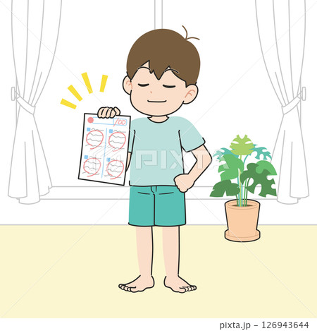 満点のテストを自慢する男の子　居間 126943644