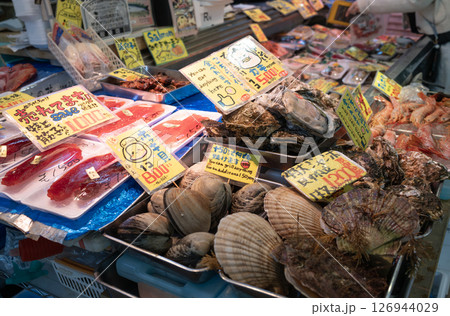 Sashimi of shellfish and fish is on sale In Sendai Asaichi Morning Market.  Sendai asaichi morning market is one of old market in sendai 126944029