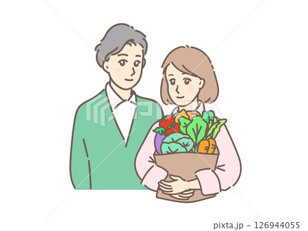 野菜を抱える素敵な若い女性と寄り添う男性。夫婦・カップルの日常風景。 126944055