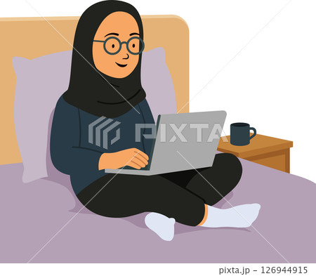 Woman with hijab relaxed on bed remote working at home Woman with hijab relaxed on bed remote working at home 126944915