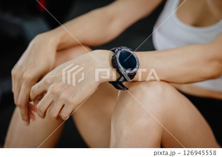 sport people wearing wrist smart watch health data tracker or exercise HR measure device 126945558