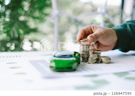 ESG strategies are driving business growth, boosting revenue and financial success by aligning economic goals with sustainable finance. growth, revenue, finance, economic, financial. green car 126947595