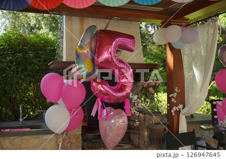 Vibrant Birthday Party Decoration with Numbered Balloons Vibrant Birthday Party Decoration with Numbered Balloons 126947645