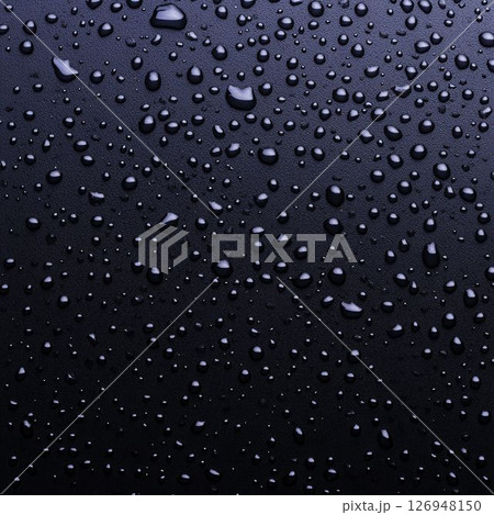 Close-Up View of Water Droplets on Dark Surface with Soft Light Reflection 126948150