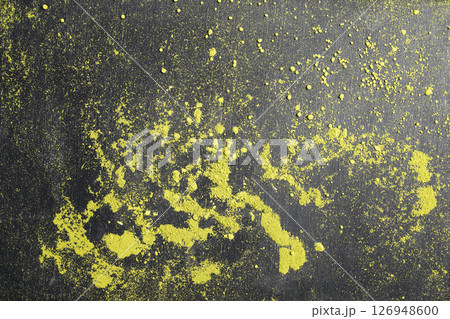 Closeup view of matcha green tea powder on the black table. Top view Closeup view of matcha green tea powder on the black table. Top view 126948600