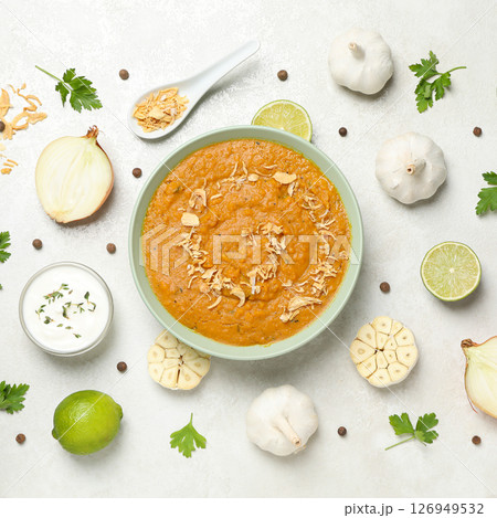 Sweet potato puree in bowl and spices on light background, top view Sweet potato puree in bowl and spices on light background, top view 126949532