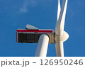 Wind turbine low angle view close-up, isolated on the blue sky 126950246