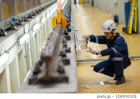 Train engineer working check inspecting railway track at Train station, advance engineering 126950328
