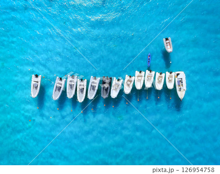 Drone view of a motorboats. Luxury transportation. Vacationing people. Azure water. Drone view of a motorboats. Luxury transportation. Vacationing people. Azure water. 126954758