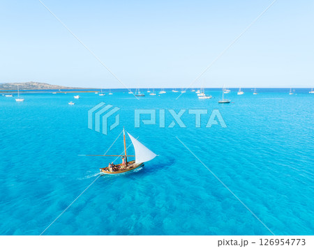 Summertime vacation. Sailing yacht at sea. Drone view on the yacht. 126954773