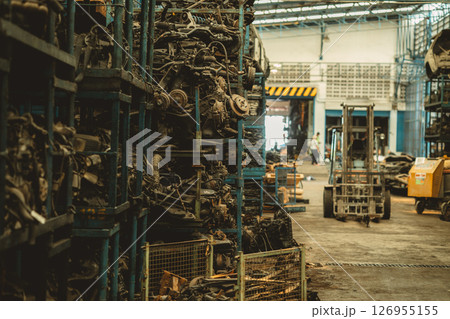 Old used car part warehouse stock inventory in garage. recycle motor junkyard auto parts management. 126955155