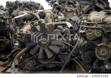 garage scrapyard, old used vehicle spare part engine block car body parts storage for recycle or repair for sale garage scrapyard, old used vehicle spare part engine block car body parts storage for recycle or repair for sale 126955168