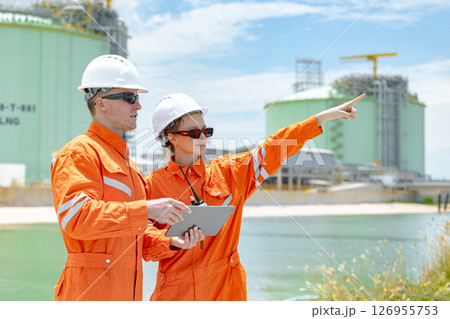 Petroleum workers, LNG tank inspection, Onshore Gas Site surveyor team, Oil Petrochemical industry 126955753