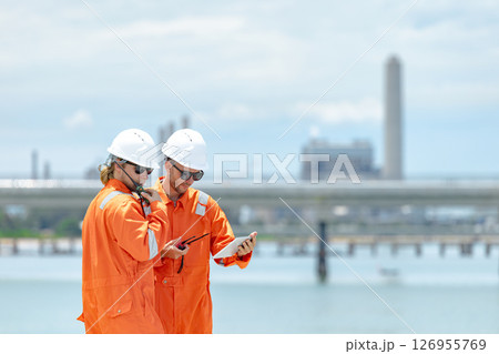 Petroleum workers, shoreline inspection, Onshore Gas Site surveyor team, Oil Petrochemical industry 126955769