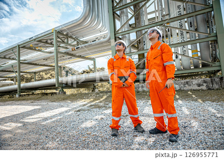 Petroleum refinery service worker, Oil and Gas outdoor pipes and valve inspector, Gas leak checking 126955771