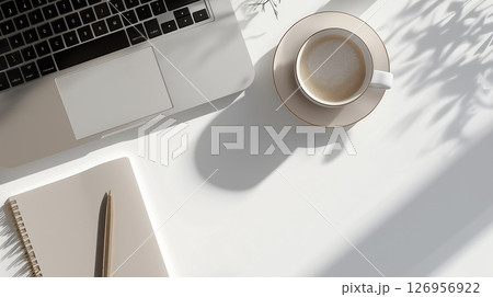 Minimalist workspace with laptop and coffee Minimalist workspace with laptop and coffee 126956922