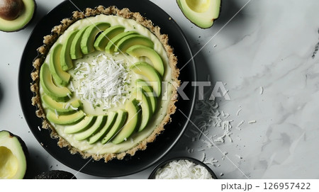 Avocado flour cake pie with coconut topping homemade snack food on plate 126957422