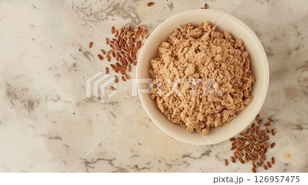 Flaxseed flour on bowl for cooking or baking copy space background Flaxseed flour on bowl for cooking or baking copy space background 126957475