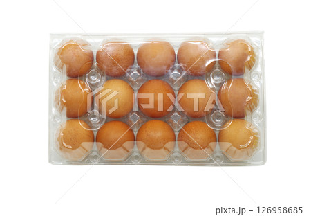 Pack of 15 chicken eggs, isolated clear plastic packaging of fifteen brown chicken eggs on a white background, flat lay image, space for branding label. 126958685