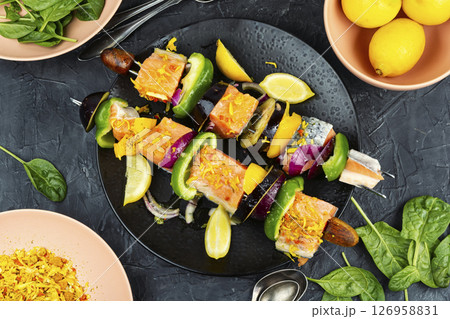 Fresh fish meat on skewers. Fresh fish meat on skewers. 126958831