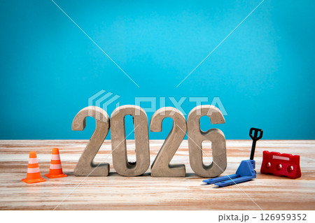 2026 Concept. Concrete Numbers on a Wooden Background 126959352