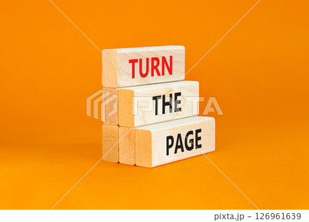 Turn the page symbol. Concept words Turn the page on beautiful wooden block. Beautiful orange table orange background. Business motivational lifestyle turn the page concept. Copy space. Turn the page symbol. Concept words Turn the page on beautiful wooden block. Beautiful orange table orange background. Business motivational lifestyle turn the page concept. Copy space. 126961639