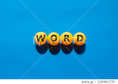 Word symbol. Concept word Word on beautiful yellow ping pong balls. Beautiful blue table blue background. Business, lifestyle, support and word concept. Copy space. Word symbol. Concept word Word on beautiful yellow ping pong balls. Beautiful blue table blue background. Business, lifestyle, support and word concept. Copy space. 126961735
