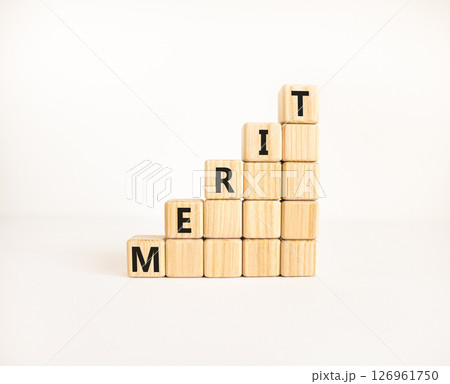 Merit symbol. Concept word Merit on beautiful wooden blocks. Beautiful white table white background. Business lifestyle merit concept. Copy space. Merit symbol. Concept word Merit on beautiful wooden blocks. Beautiful white table white background. Business lifestyle merit concept. Copy space. 126961750