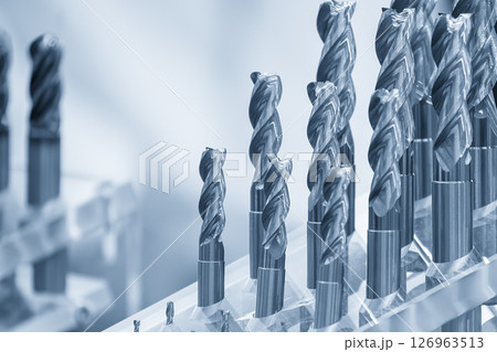 Close-up scene the group of bull nose or radius end mill tools in the light blue scene. 126963513