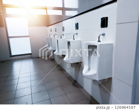 Urinals in men's restrooms, toilets 126964587