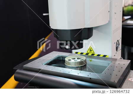 Optic machine for precise measurement of part size and quality evaluation. Smart factory. Optic machine for precise measurement of part size and quality evaluation. Smart factory. 126964732