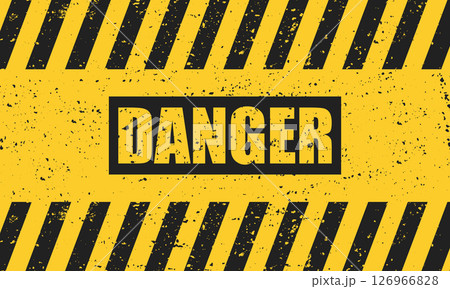 Abstract grunge black danger sign on a yellow background. 126966828