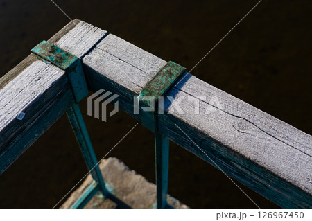 Frost on wooden railings, fences. Frost. Macro. Diagonal lines 126967450