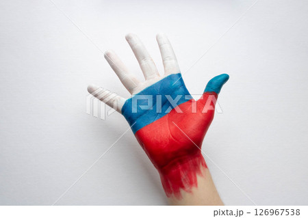 For Russia Day, an open palm, painted in the colors of the Russian flag. The concept of peace friendship and creation 126967538