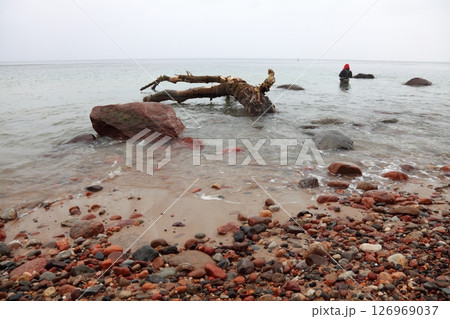 Fisherman Stones in sea water autumn 126969037