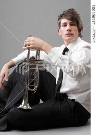 Portrait of a young man and his Trumpet Portrait of a young man and his Trumpet 126969088