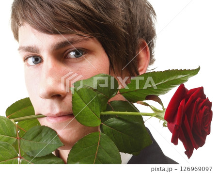 Young man, flower, red rose isolated Young man, flower, red rose isolated 126969097