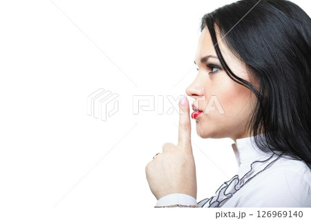 Young girl asking for silence 126969140
