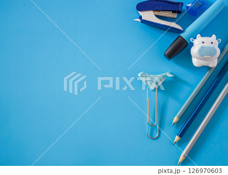 Minimal design of school supplies in soft blue colors for modern learning.Copy sapce. 126970603