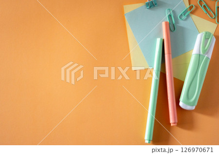 Aesthetic school supplies flat design on minimalist orange background. 126970671