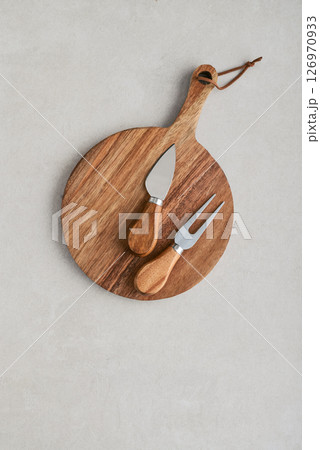 Cheese knife set and circle wooden board with handle Cheese knife set and circle wooden board with handle 126970933