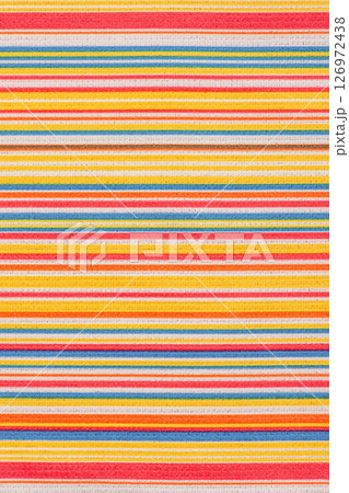 Striped fabric in multi-colored. Microfiber as a texture macro photo. 126972438