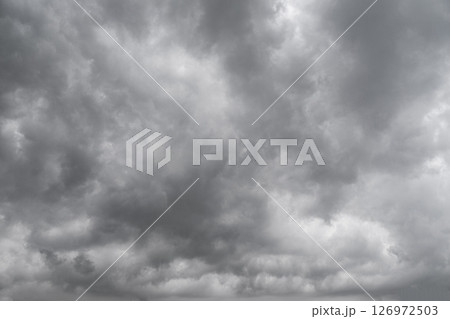 Rain cloud in the sky. Background of dark clouds before thunder storm and rain. Abstract dramatic clouds sky. Rain cloud in the sky. Background of dark clouds before thunder storm and rain. Abstract dramatic clouds sky. 126972503