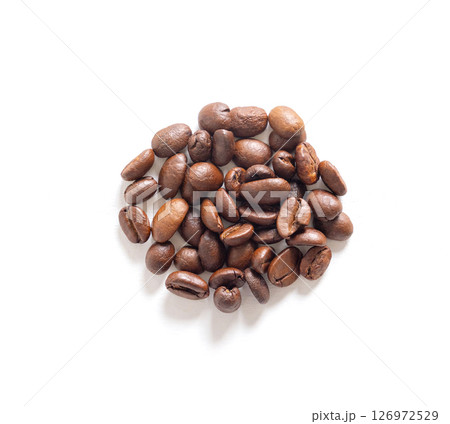 Organic coffee beans seeds on white background. Close up image. 126972529