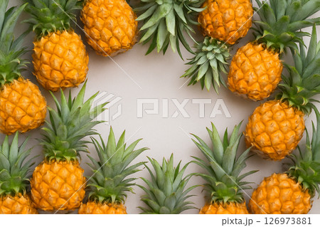Fresh pineapple pile with water drops top view 126973881