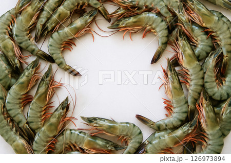 Fresh black tiger prawns whole top view white 126973894