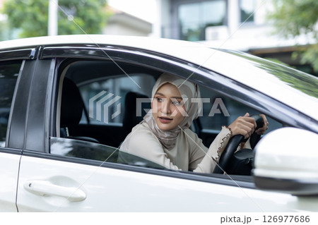 muslim women lifestyle contemporary driving car by yourself. Islam achievement businesswoman freedom religion. Female driver traffic trip. muslim women lifestyle contemporary driving car by yourself. Islam achievement businesswoman freedom religion. Female driver traffic trip. 126977686