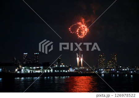 Fireworks display over Yokohama Port during a lively festival celebration at night Fireworks display over Yokohama Port during a lively festival celebration at night 126978522
