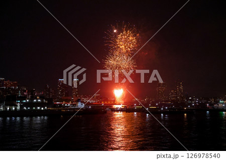 Fireworks display over Yokohama Port during a lively festival celebration at night 126978540